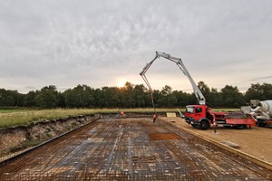 Big crane laying the foundations of a Tibetan Buddhist Temple in England.